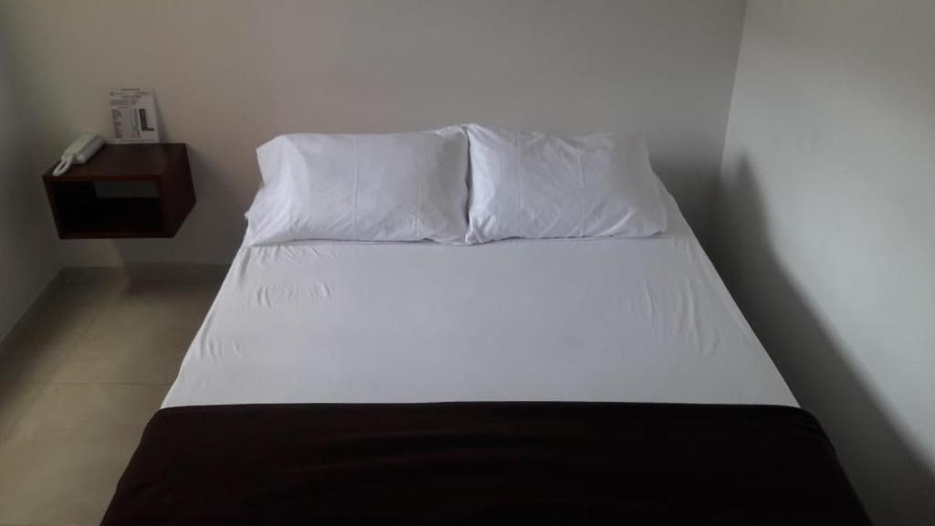 Postel nebo postele na pokoji v ubytování Hotel Don Luis