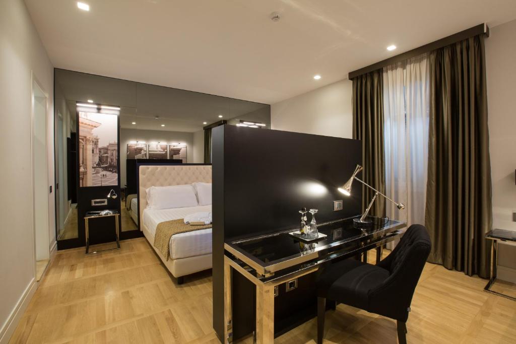 TV a/nebo společenská místnost v ubytování Floris Hotel