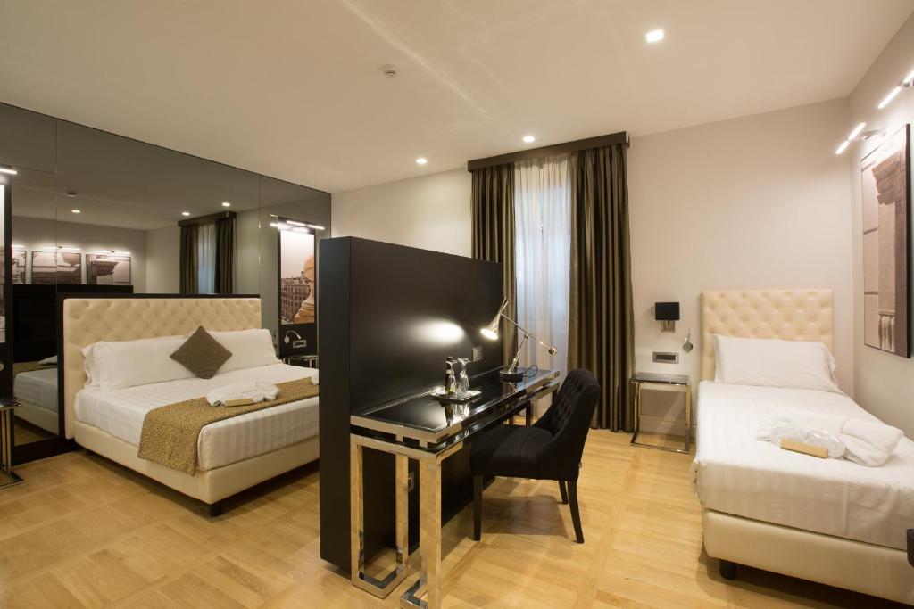 Postel nebo postele na pokoji v ubytování Floris Hotel