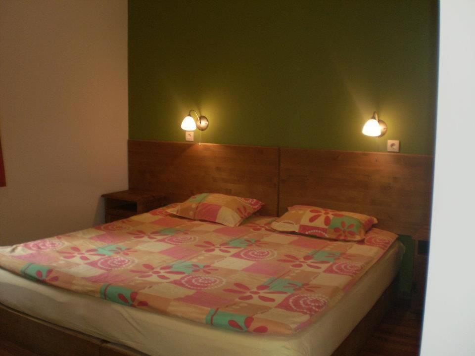 Postel nebo postele na pokoji v ubytování Sinia Vir Eco Residence