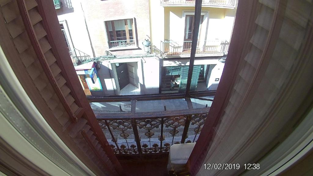 Balkón nebo terasa v ubytování Hostal Hispalense