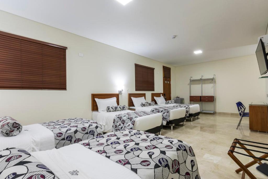 Postel nebo postele na pokoji v ubytování Hotel Dorado La 70