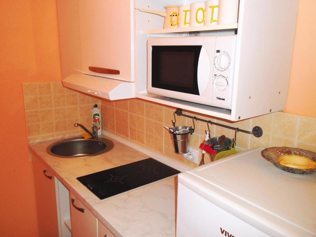 Kuchyňa alebo kuchynka v ubytovaní Apartments Kestenovi Dvori