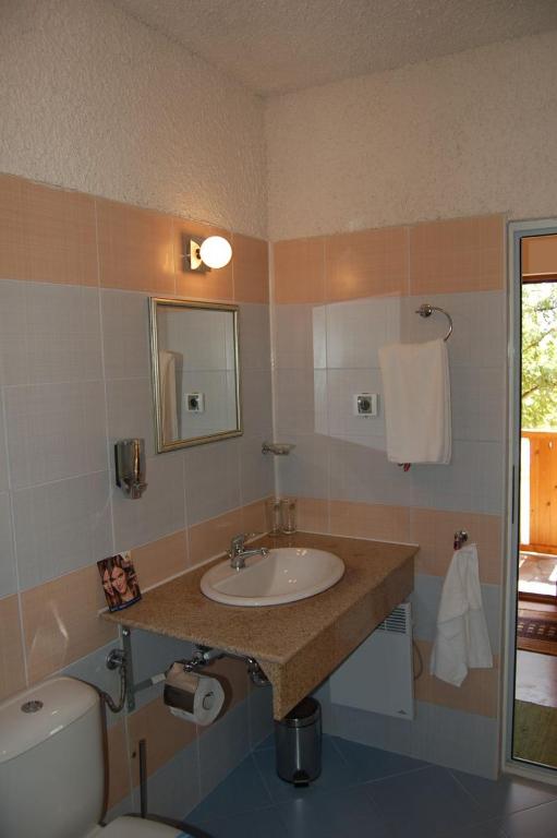 Koupelna v ubytování Sinia Vir Eco Residence