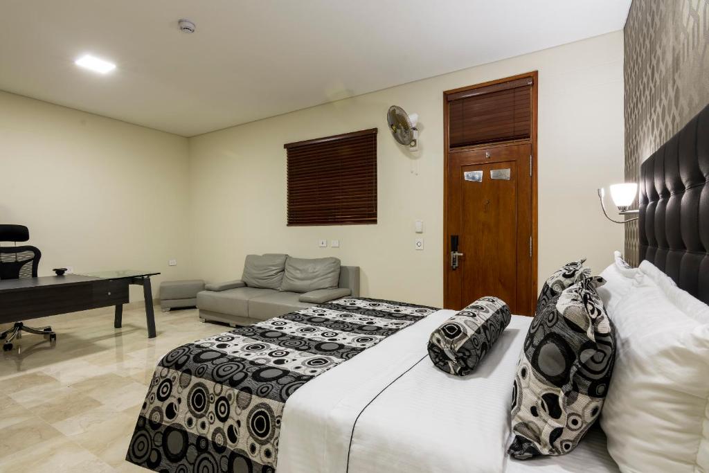 Postel nebo postele na pokoji v ubytování Hotel Dorado La 70