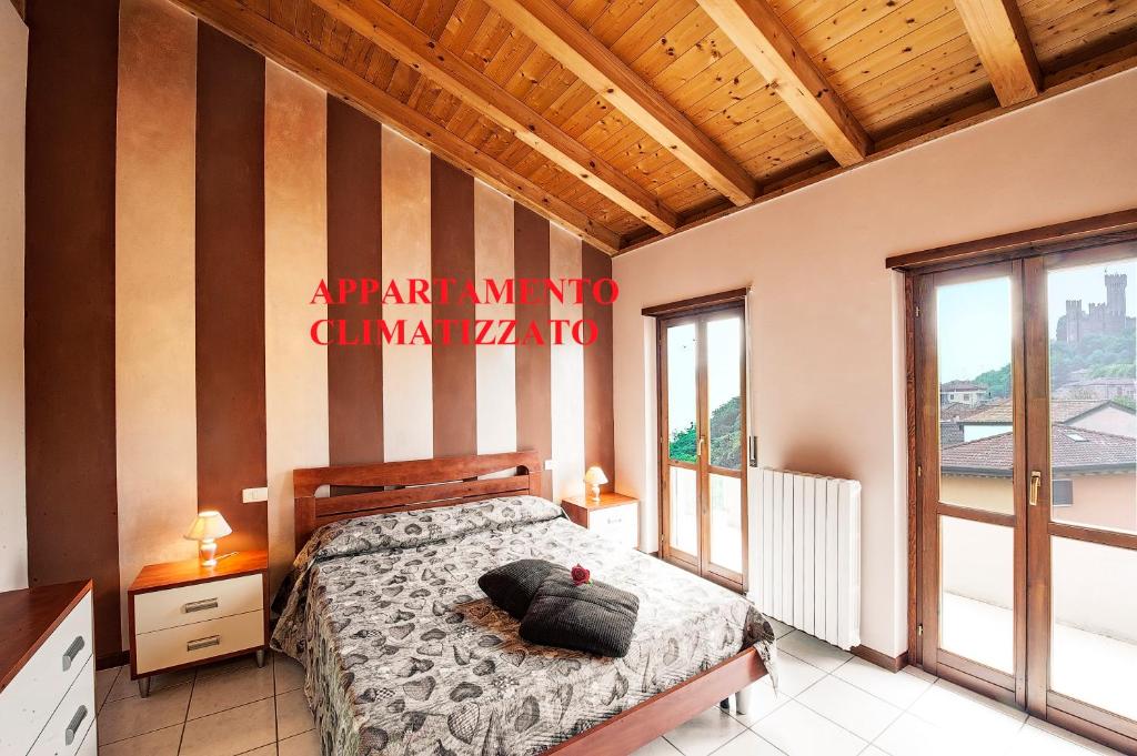 Postel nebo postele na pokoji v ubytování casabelvedere