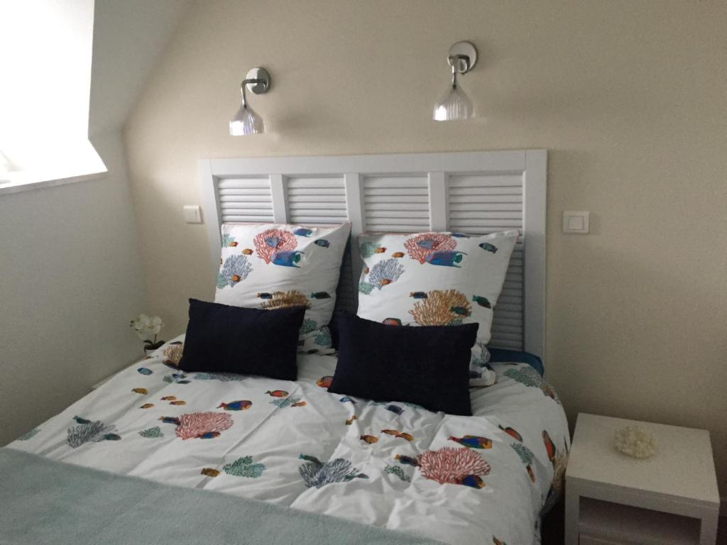Postel nebo postele na pokoji v ubytování Appartements Duplex de Charme à Bénodet Vue Mer