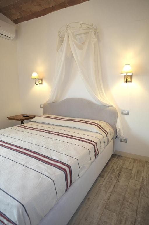 Postel nebo postele na pokoji v ubytování Casa Del Principe