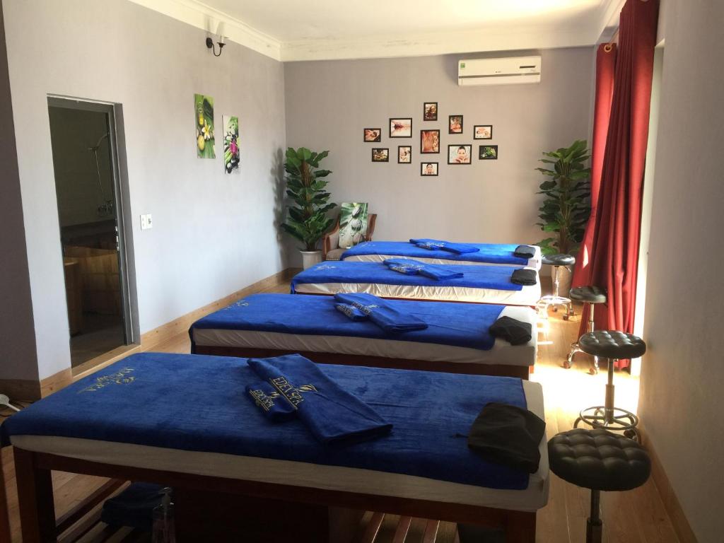 Giường trong phòng chung tại Eden Boutique Hotel & Spa