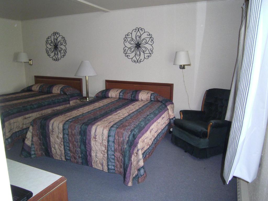Postel nebo postele na pokoji v ubytování The Willows Motel