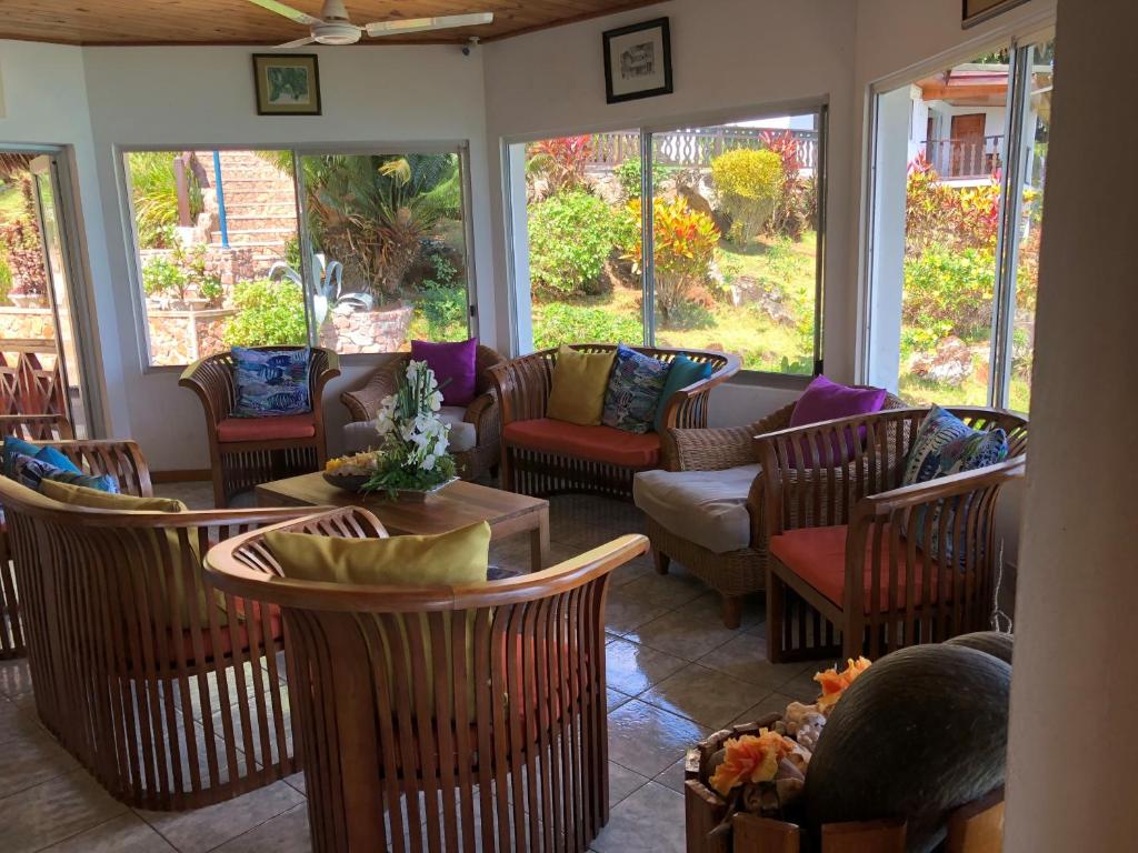Posezení v ubytování Cote Jardin - Chalets Cote Mer