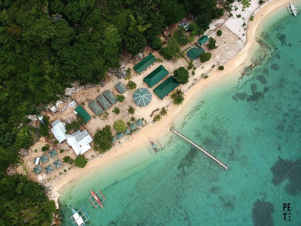 an aerial view of a beach with a resort at Se San Beach Resort-Isla de Gigantes in Carles
