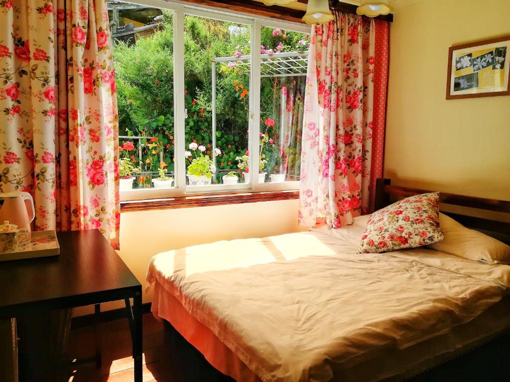 Postel nebo postele na pokoji v ubytování Kangding Guozhuang Nan Wu Hao Boutique Inn