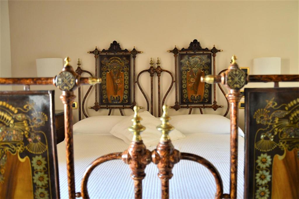 Postel nebo postele na pokoji v ubytování S. Martin Hotel