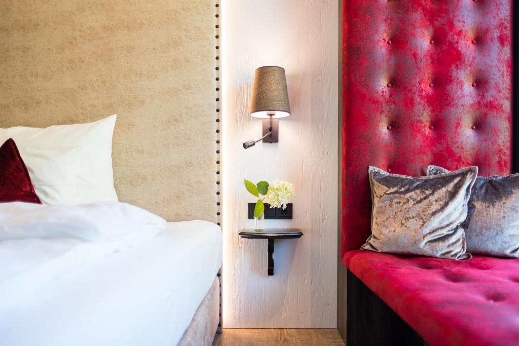 Postel nebo postele na pokoji v ubytování Eriks Hotel