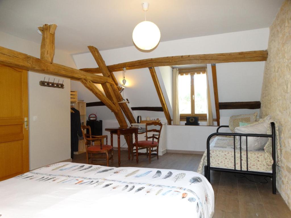 Postel nebo postele na pokoji v ubytování B&B Le Corbier