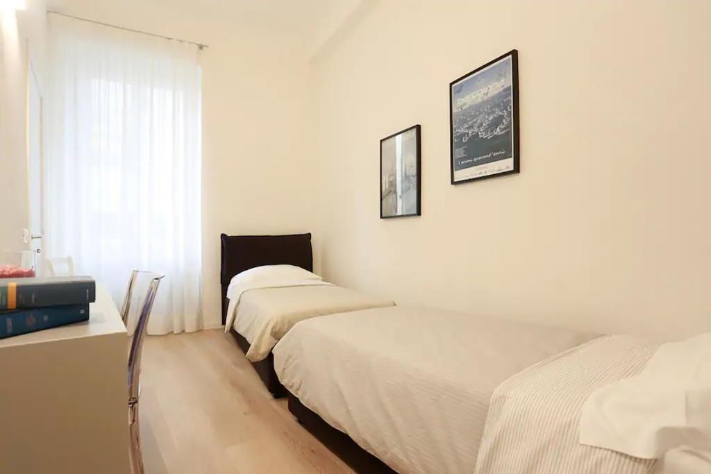 Posteľ alebo postele v izbe v ubytovaní Opera 19 Luxury Apartment