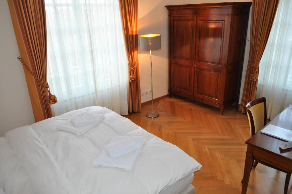 Postel nebo postele na pokoji v ubytování Domaine de Mont-Renaud