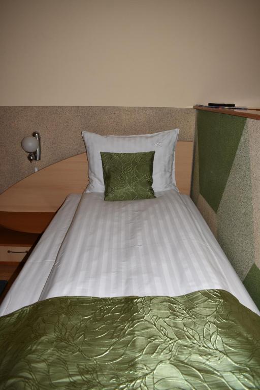 Postel nebo postele na pokoji v ubytování Hotel Zimbru