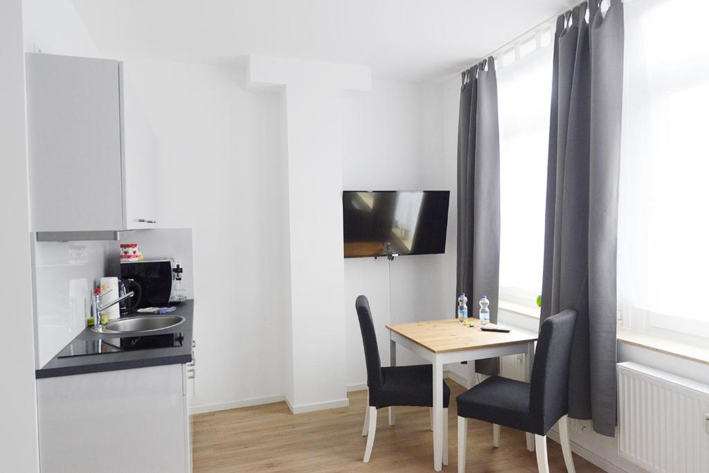 Kuchyň nebo kuchyňský kout v ubytování Basement Küchgarten