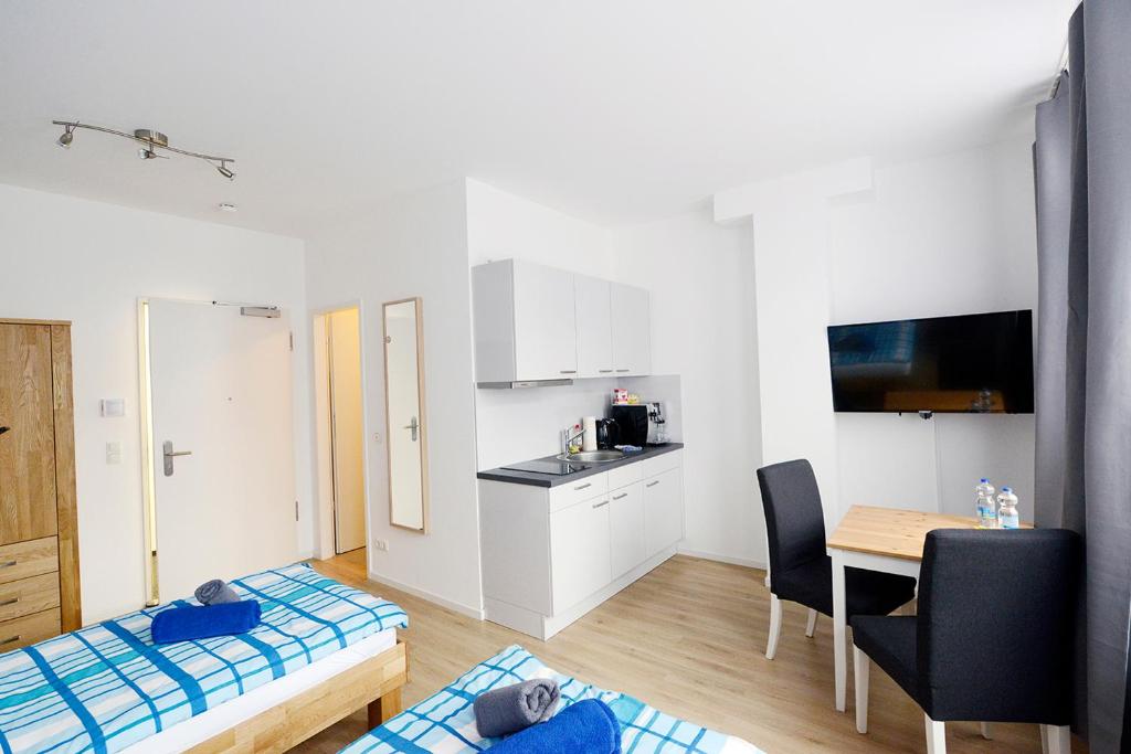 Kuchyň nebo kuchyňský kout v ubytování Basement Küchgarten