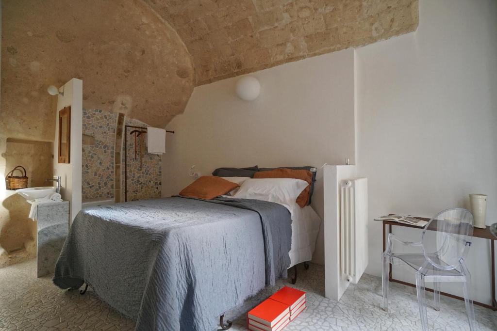 Postel nebo postele na pokoji v ubytování Il Carrubo residenza Walk&Stay