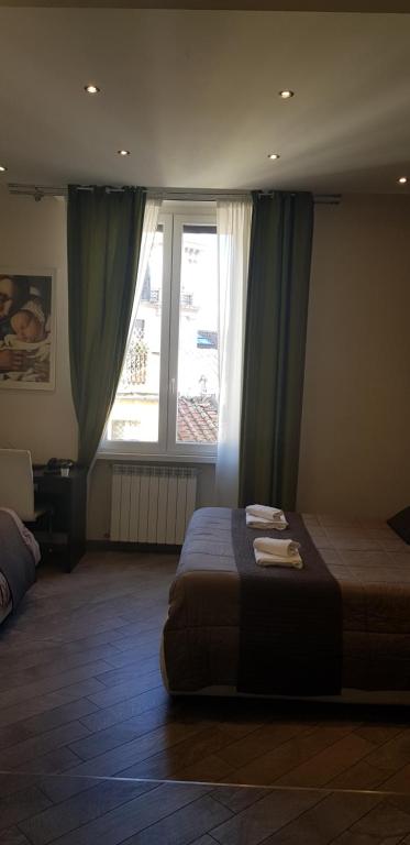 Postel nebo postele na pokoji v ubytování Mia Suites