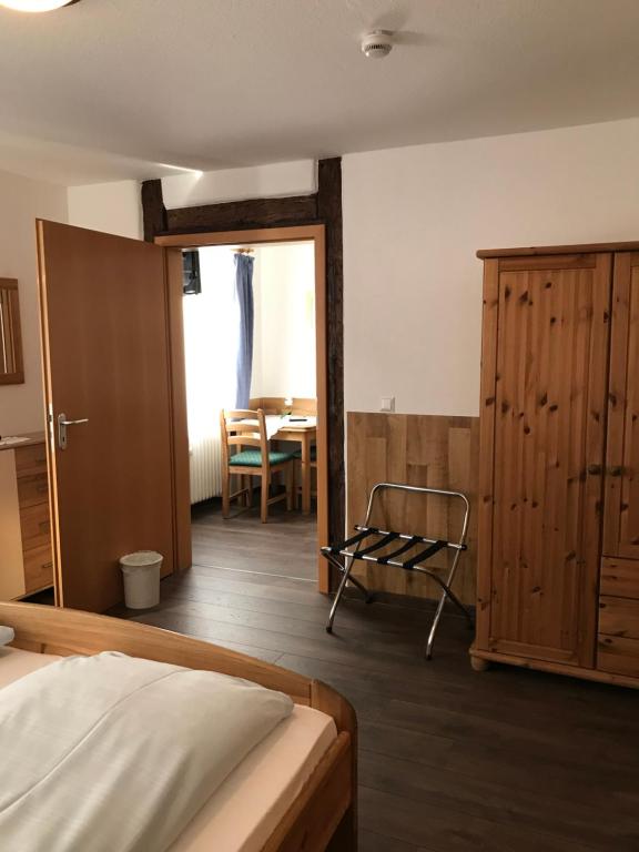Postel nebo postele na pokoji v ubytování Hotel Guntia Boardinghouse