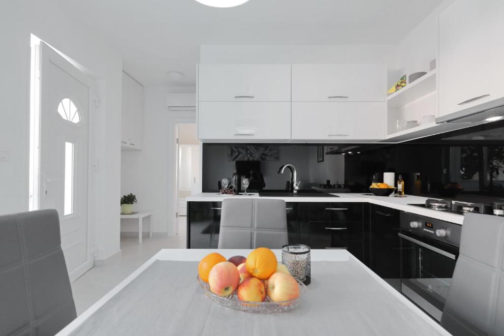 Kuchyň nebo kuchyňský kout v ubytování Luxury Apartment Bella