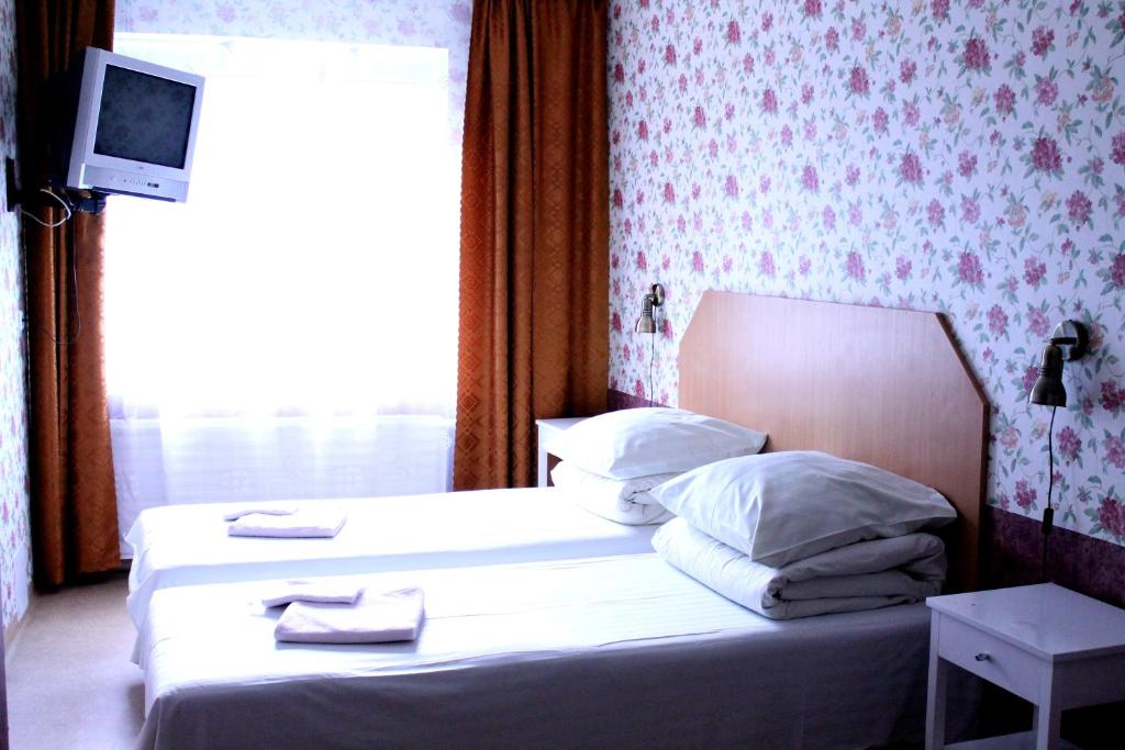 Postel nebo postele na pokoji v ubytování Velga