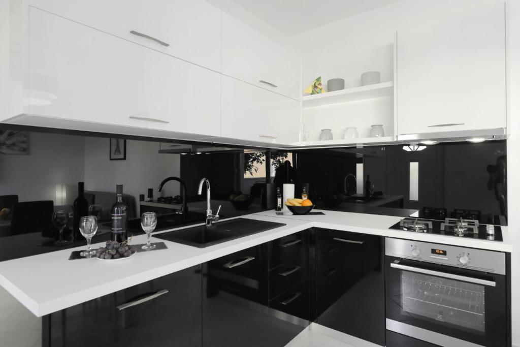 Kuchyň nebo kuchyňský kout v ubytování Luxury Apartment Bella