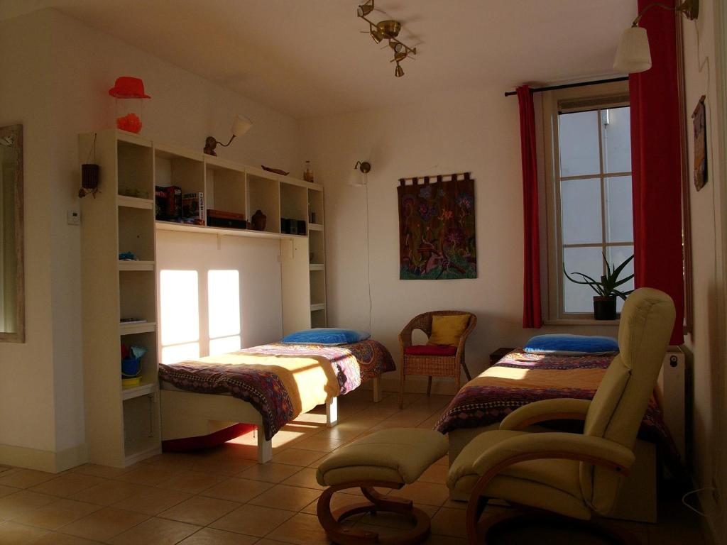 Postel nebo postele na pokoji v ubytování Dar Cho Apartment