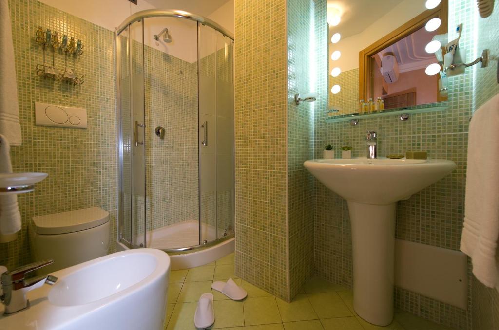 Koupelna v ubytování Hotel Panizza