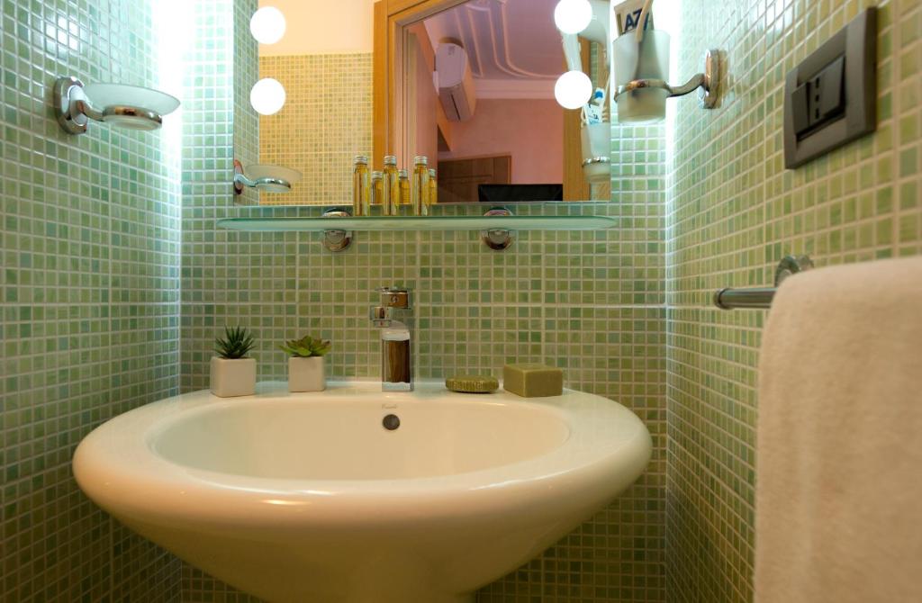 Koupelna v ubytování Hotel Panizza