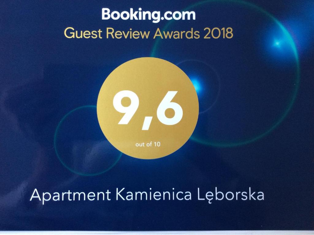 złoty krąg ze słowami quest review w obiekcie Apartment Kamienica Lęborska w Gdańsku