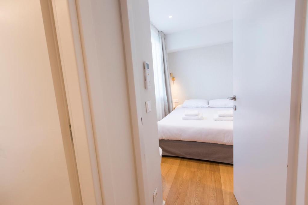 Posteľ alebo postele v izbe v ubytovaní Syntagma Apartments by Olala Homes