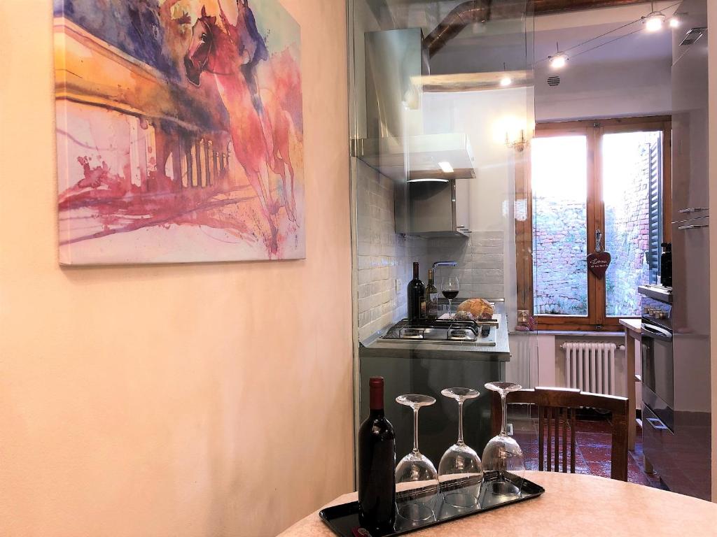 Kuchyňa alebo kuchynka v ubytovaní SIENA ROMANTIC EXPERIENCE