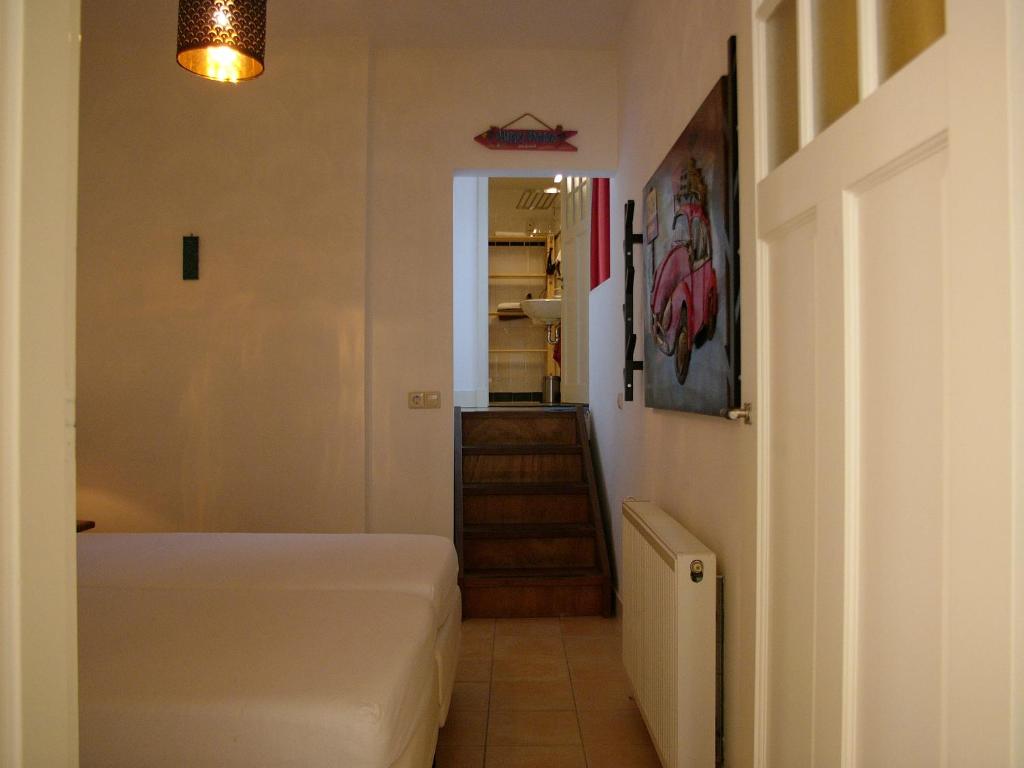Postel nebo postele na pokoji v ubytování Dar Cho Apartment