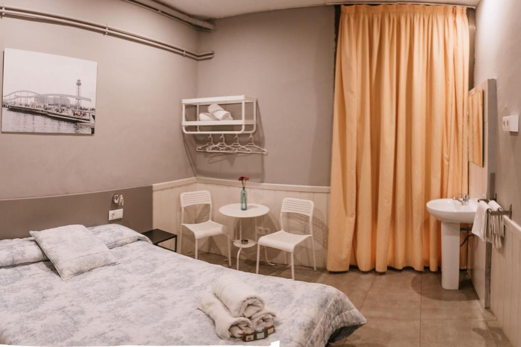 Postel nebo postele na pokoji v ubytování Pensión 45