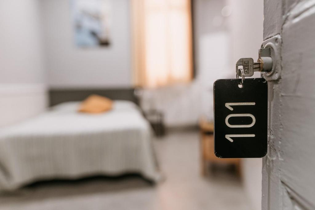 Postel nebo postele na pokoji v ubytování Pensión 45