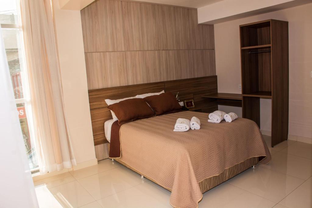 Postel nebo postele na pokoji v ubytování SERPYL Plaza Hotel