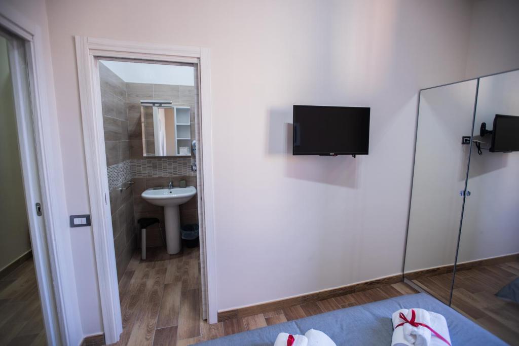 TV a/nebo společenská místnost v ubytování Bellorizzonte