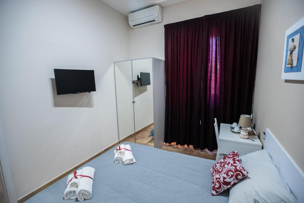Postel nebo postele na pokoji v ubytování Bellorizzonte