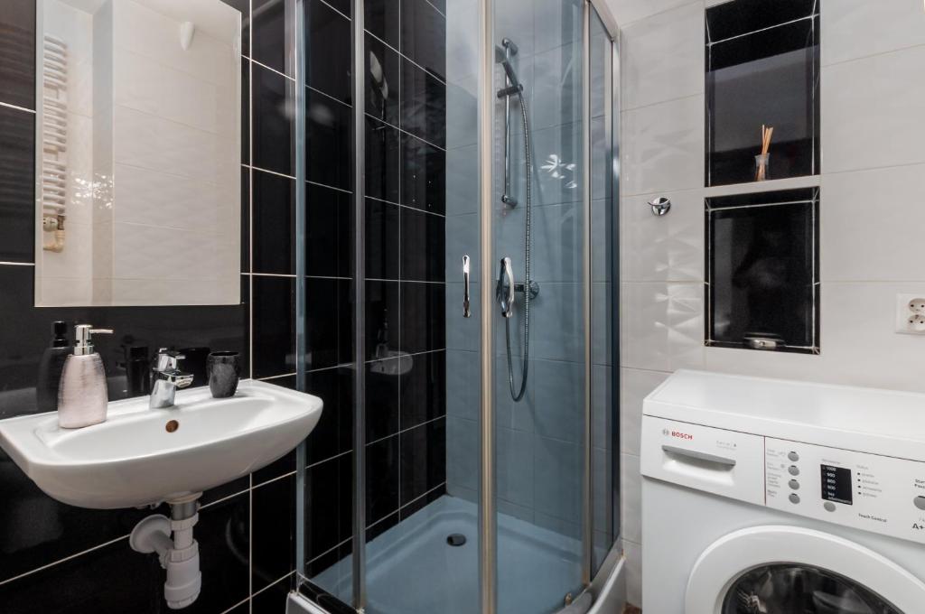 Kúpeľňa v ubytovaní Apartments Madelaine Warsaw by Noclegi Renters