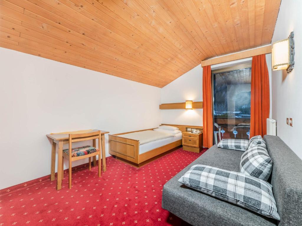 Postel nebo postele na pokoji v ubytování Hotel Pontives