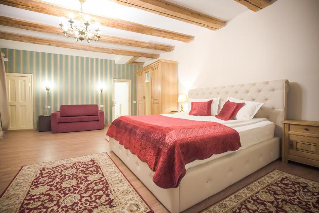 Postel nebo postele na pokoji v ubytování Safrano Palace