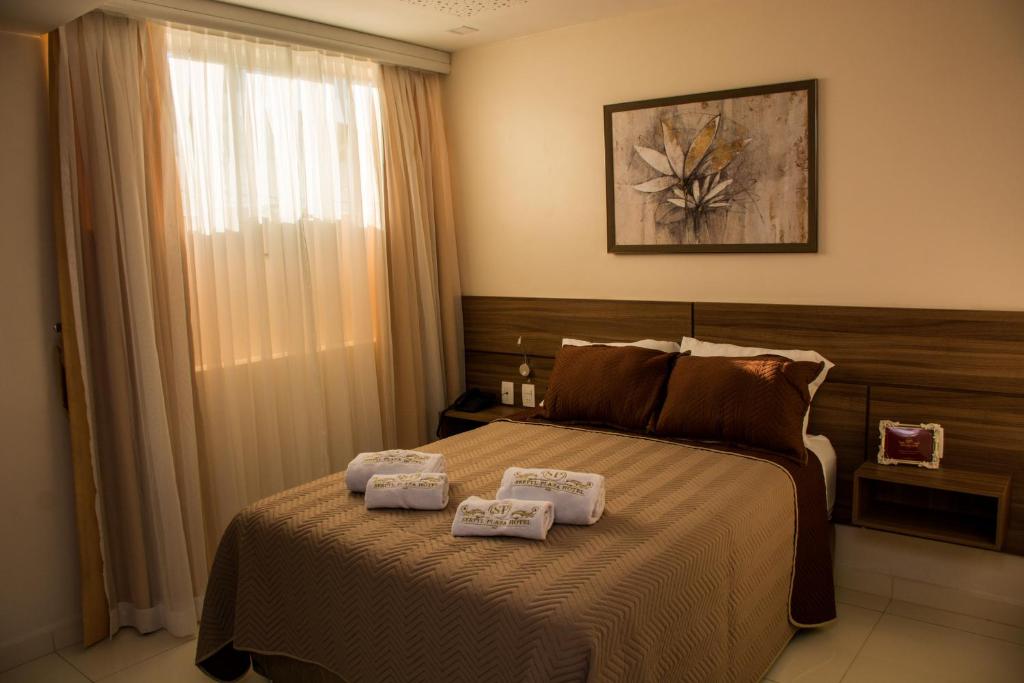 Postel nebo postele na pokoji v ubytování SERPYL Plaza Hotel