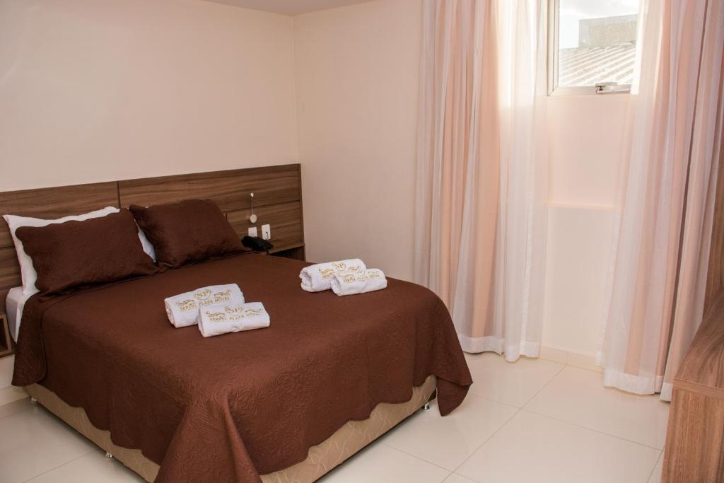 Postel nebo postele na pokoji v ubytování SERPYL Plaza Hotel