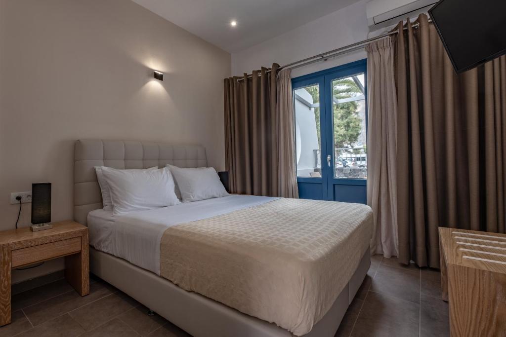 Una cama o camas en una habitación de Tristhenia
