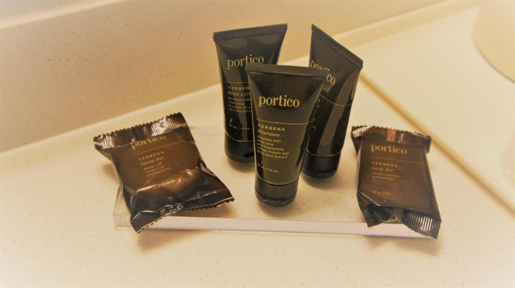 a group of three products sitting on a mirror at Wingate by Wyndham - Chattanooga in Chattanooga